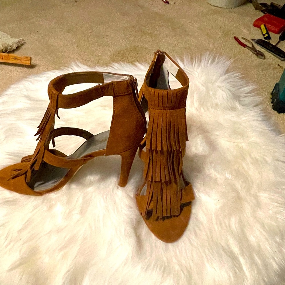 Fun and fringe brown open toed pumps